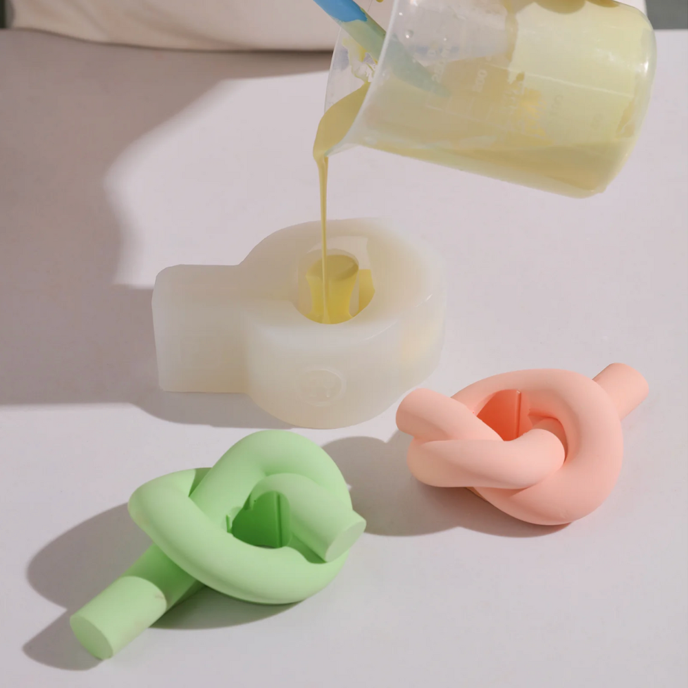 Boowan Nicole: Knot Shape Taper Candle Holder Silicone Mould